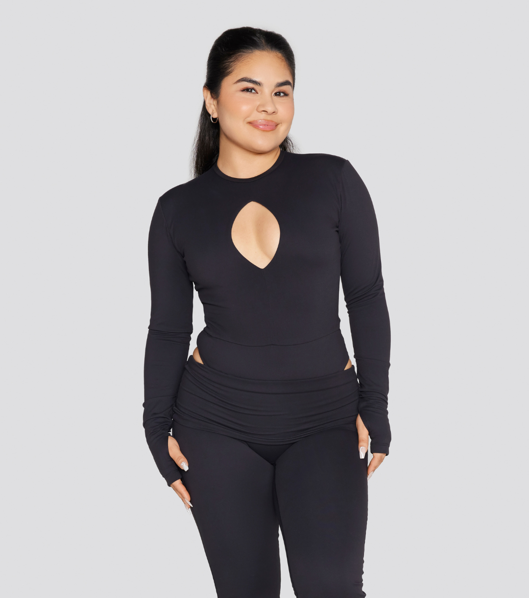 EXPOSED REVERSIBLE LONG SLEEVE BODYSUIT