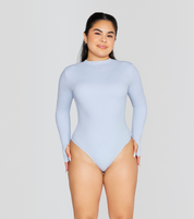 EXPOSED REVERSIBLE LONG SLEEVE BODYSUIT