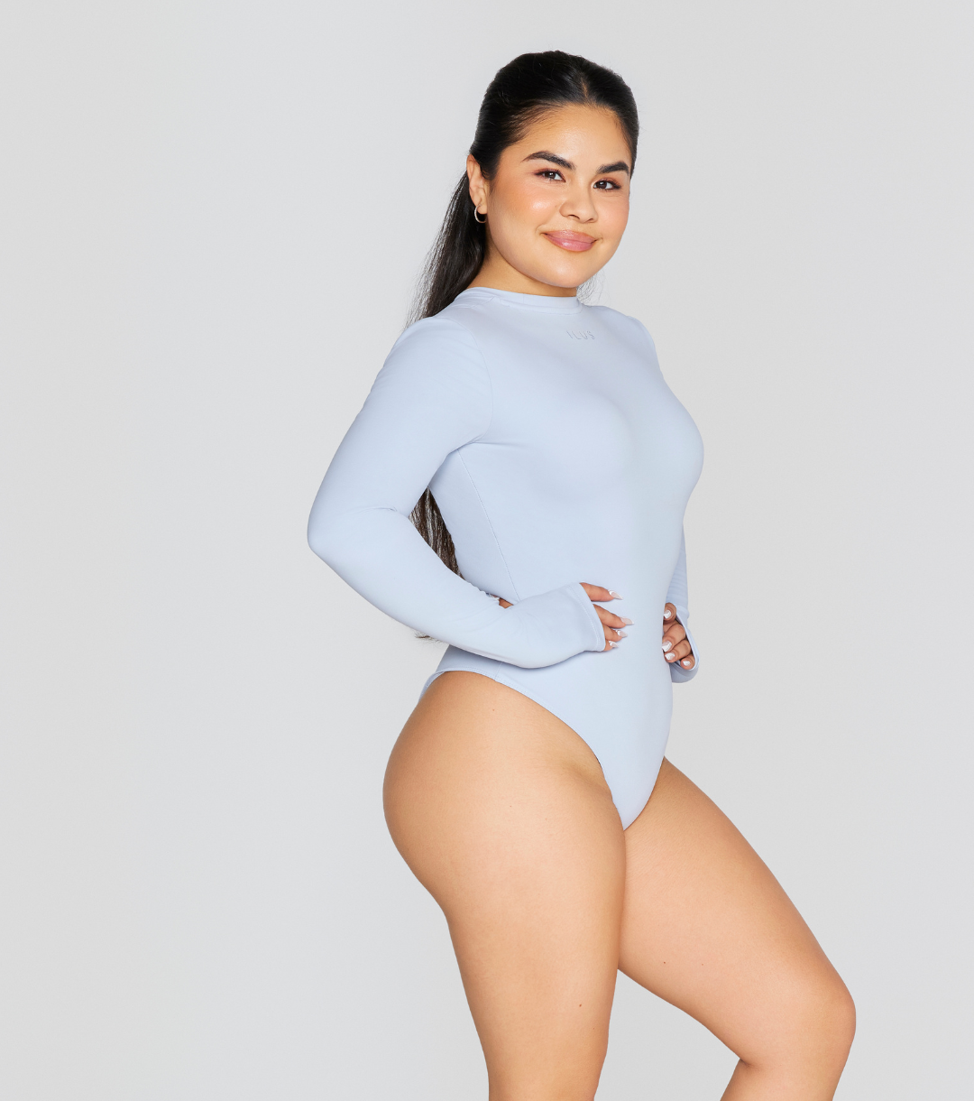EXPOSED REVERSIBLE LONG SLEEVE BODYSUIT