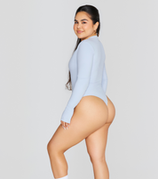 EXPOSED REVERSIBLE LONG SLEEVE BODYSUIT