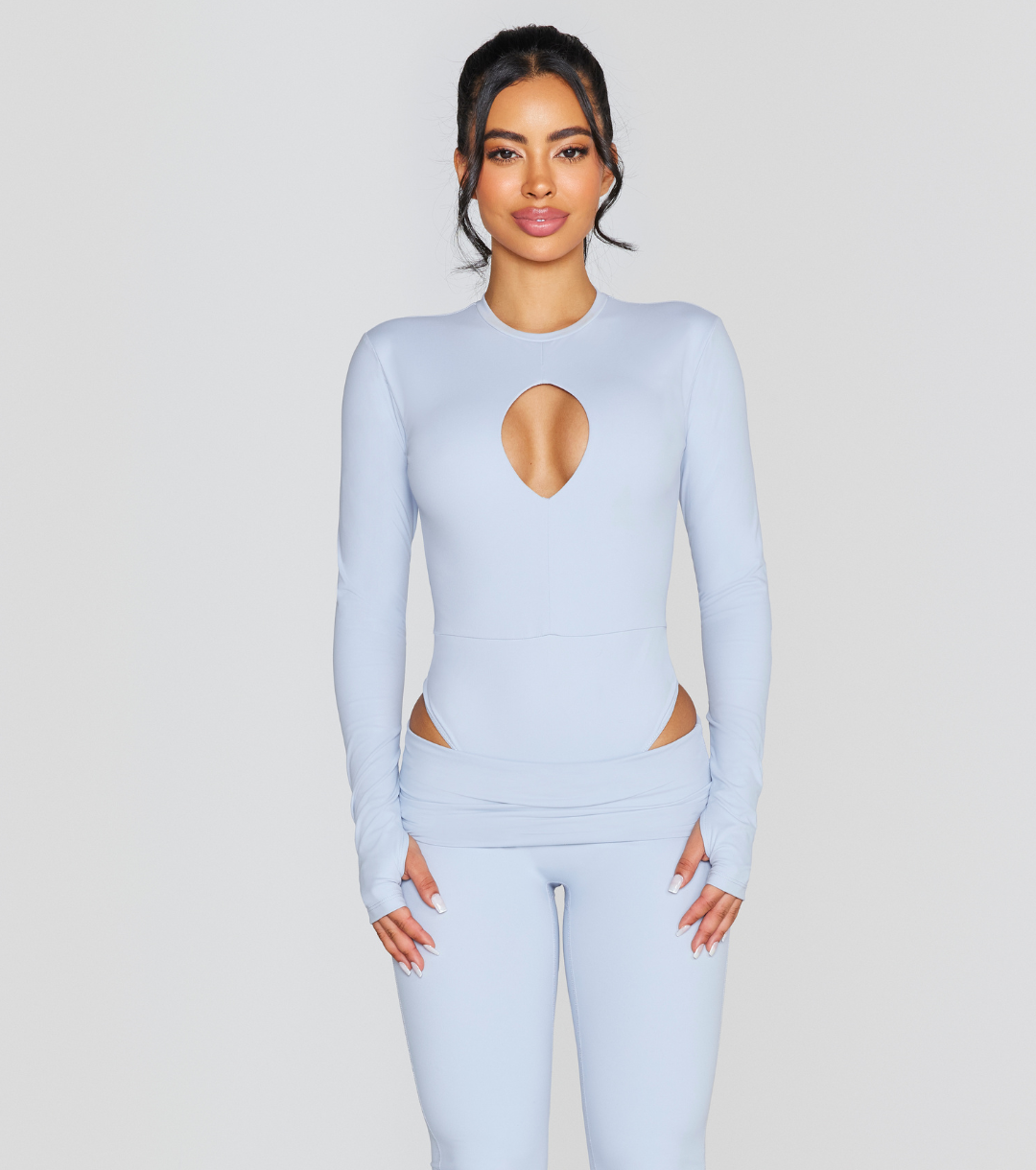 EXPOSED REVERSIBLE LONG SLEEVE BODYSUIT