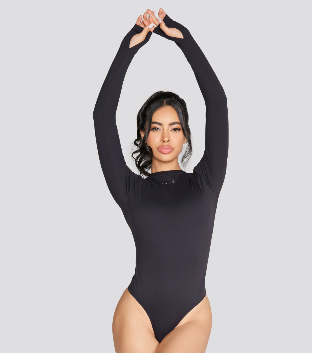 EXPOSED REVERSIBLE LONG SLEEVE BODYSUIT