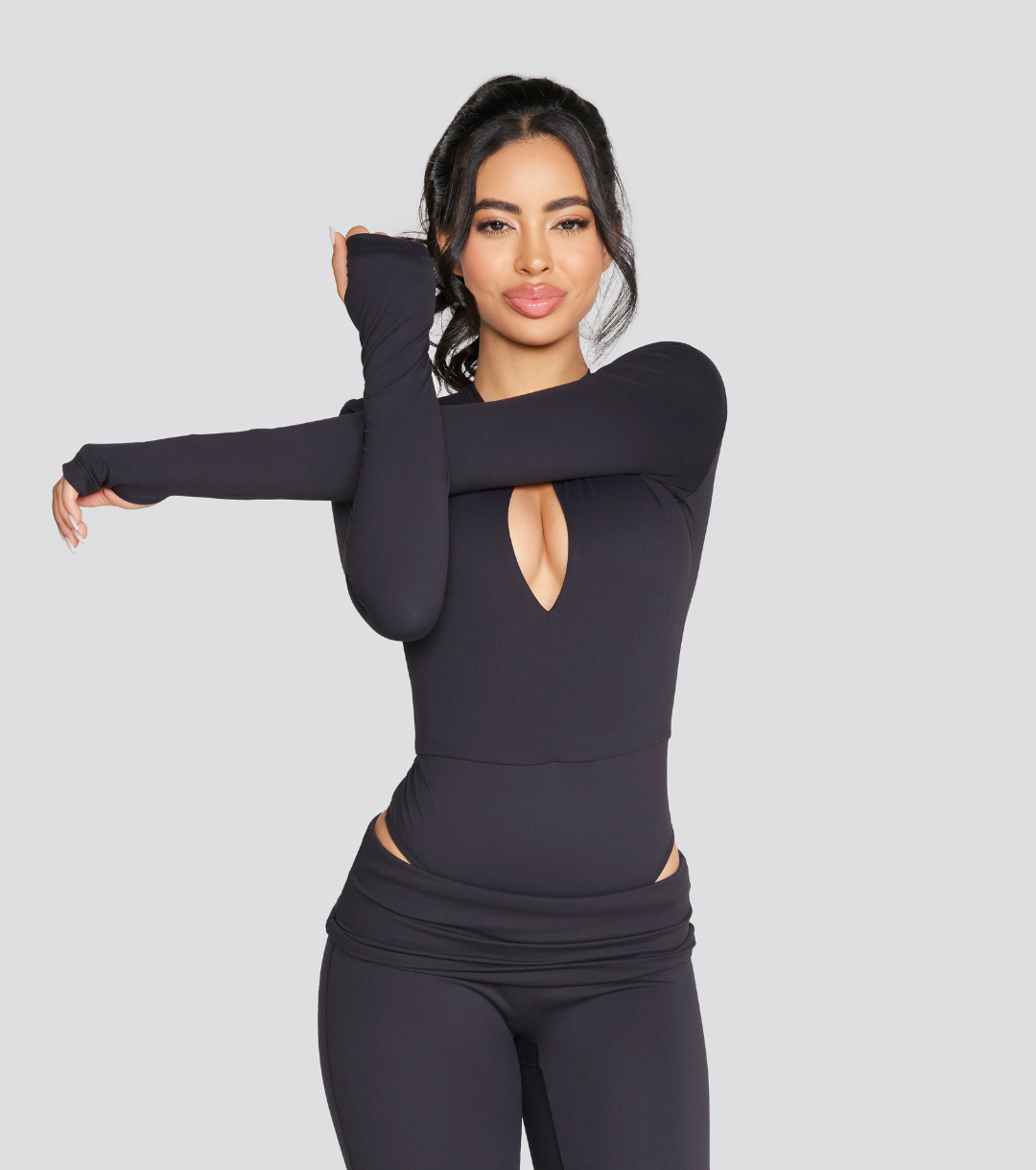 EXPOSED REVERSIBLE LONG SLEEVE BODYSUIT