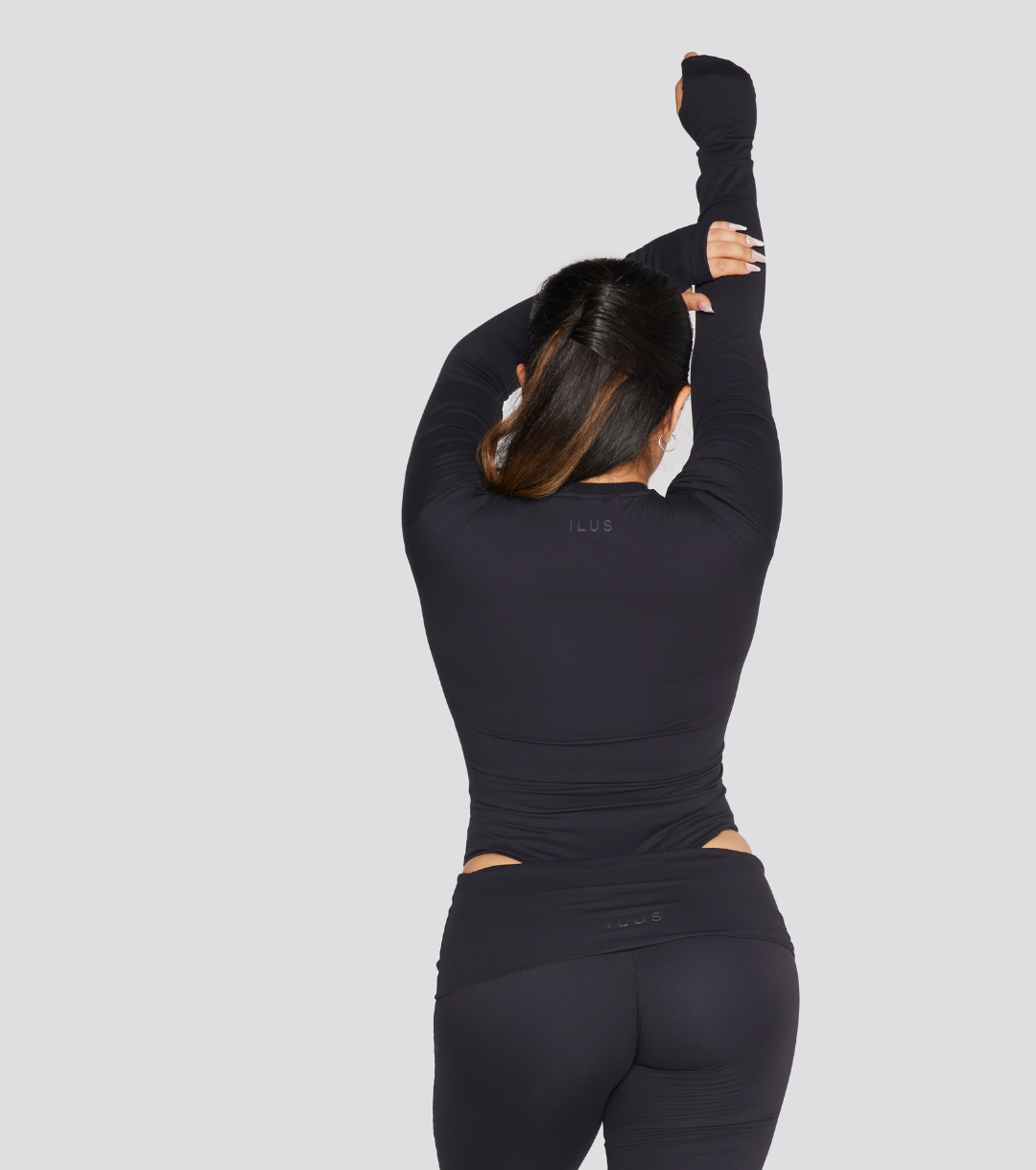 EXPOSED REVERSIBLE LONG SLEEVE BODYSUIT